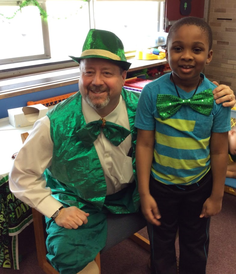 Leprechaun visit with students.